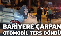 Bariyere çarpan otomobil ters döndü