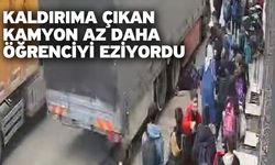 Kaldırıma çıkan kamyon az daha öğrenciyi eziyordu