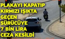 Plakayı kapatıp kırmızı ışıkta geçen sürücüye 7 bin lira ceza kesildi