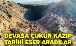 Devasa çukur kazıp tarihi eser aradılar