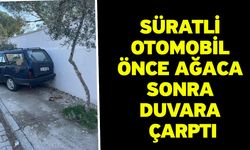 Süratli otomobil önce ağaca sonra duvara çarptı