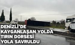Denizli’de kayganlaşan yolda tırın dorsesi yola savruldu