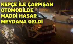 Kepçe ile çarpışan otomobilde maddi hasar meydana geldi