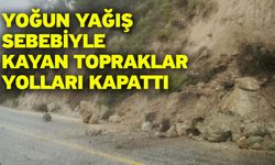 Yoğun yağış sebebiyle kayan topraklar yolları kapattı