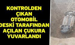 Kontrolden çıkan otomobil DESKİ tarafından açılan çukura yuvarlandı