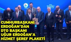 Cumhurbaşkanı Erdoğan’dan DTO Başkanı Uğur Erdoğan’a Hizmet Şeref Plaketi