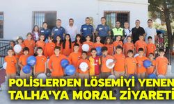 Polislerden lösemiyi yenen Talha'ya moral ziyareti
