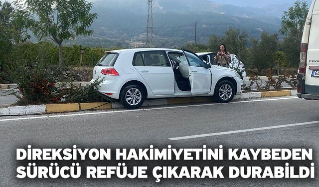 Direksiyon hakimiyetini kaybeden sürücü refüje çıkarak durabildi