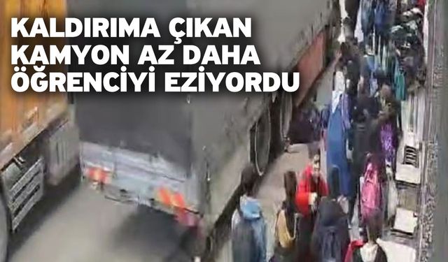 Kaldırıma çıkan kamyon az daha öğrenciyi eziyordu