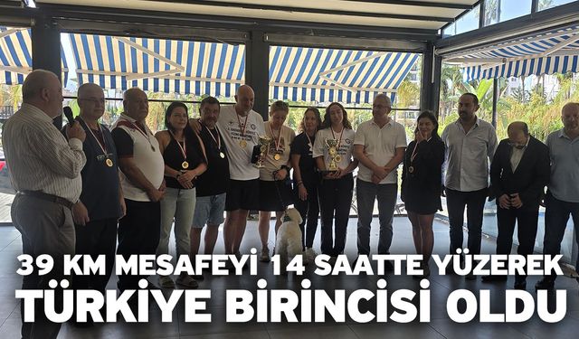 39 km mesafeyi 14 saatte yüzerek Türkiye birincisi oldu