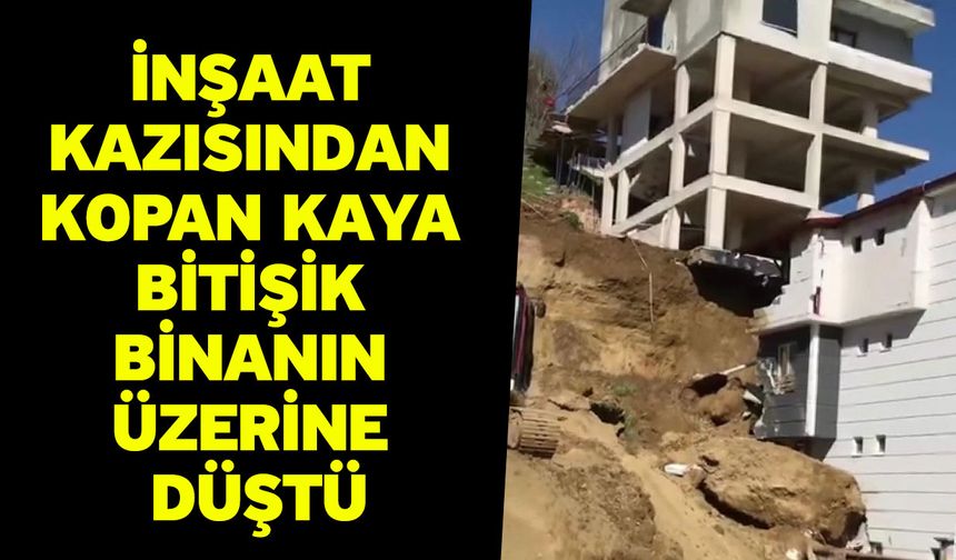 İnşaat kazısından kopan kaya bitişik binanın üzerine düştü